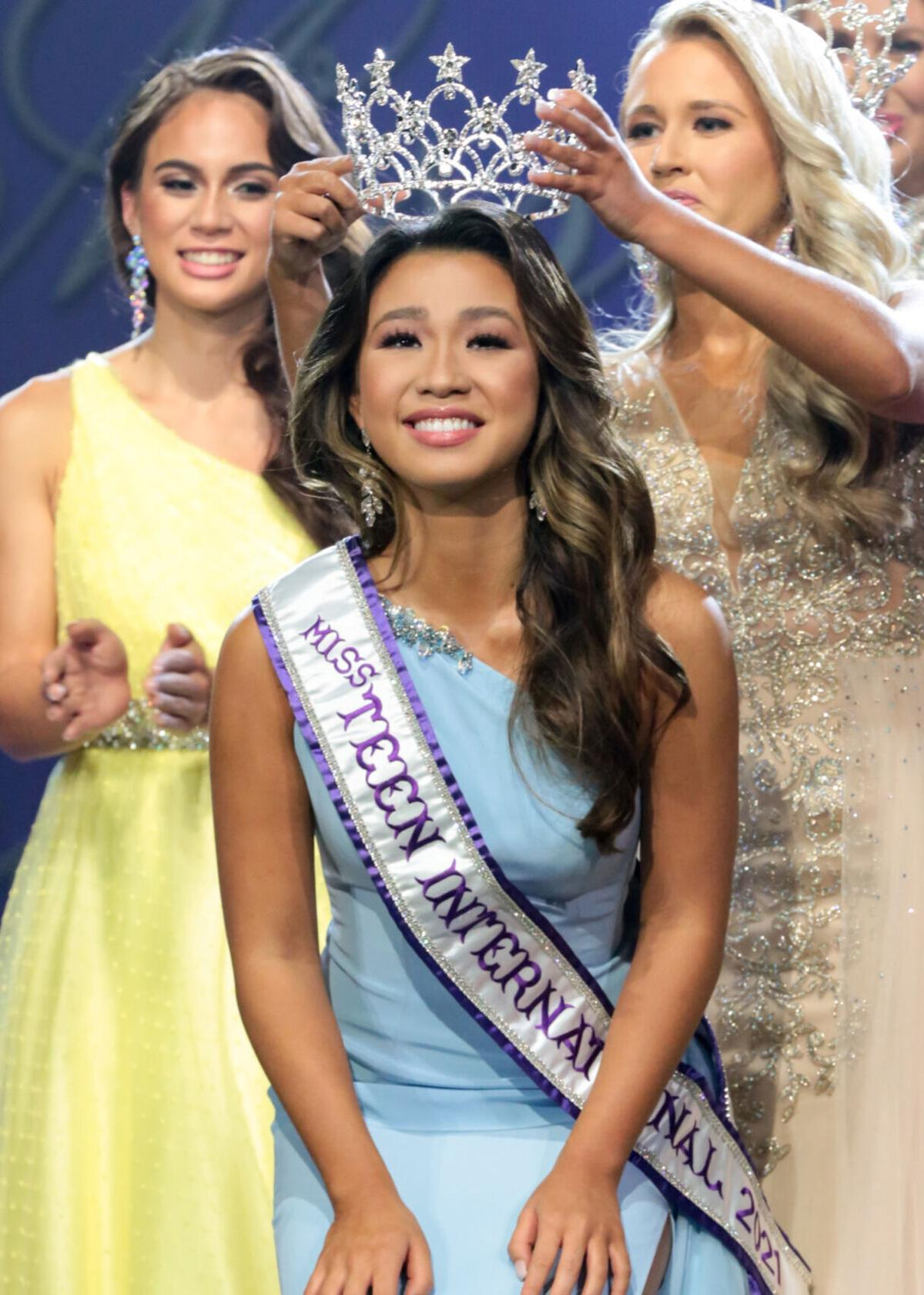 Katie in an evening gown during the Miss Teen International competition